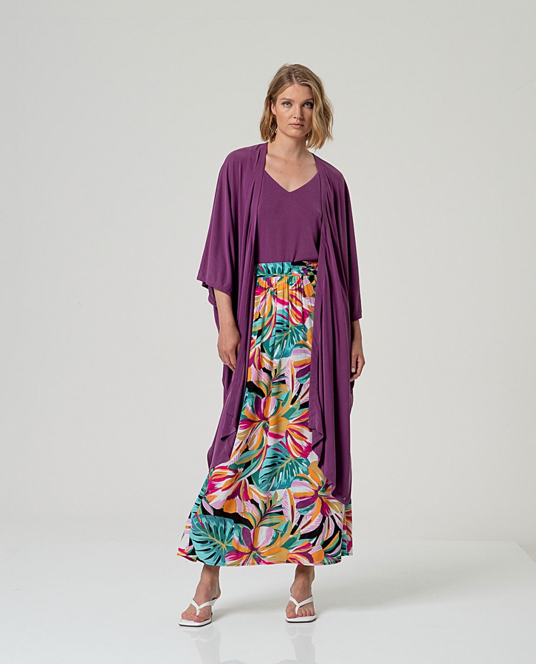 Long open modal purple kimono with sleeves.