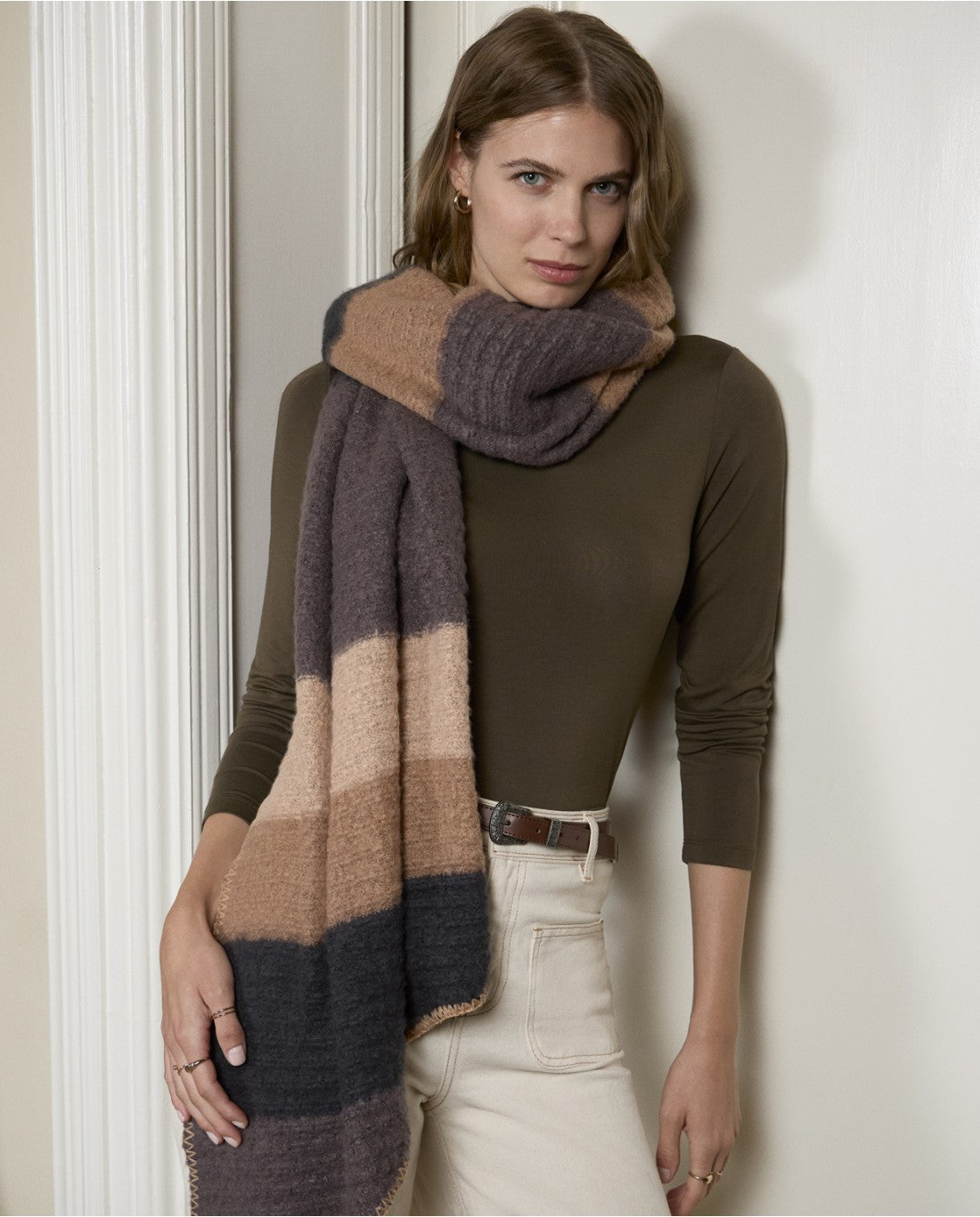 Knitted scarf with striped design in warm tones and asymmetrical cut, grey, beige,  ecru and dark grey colors