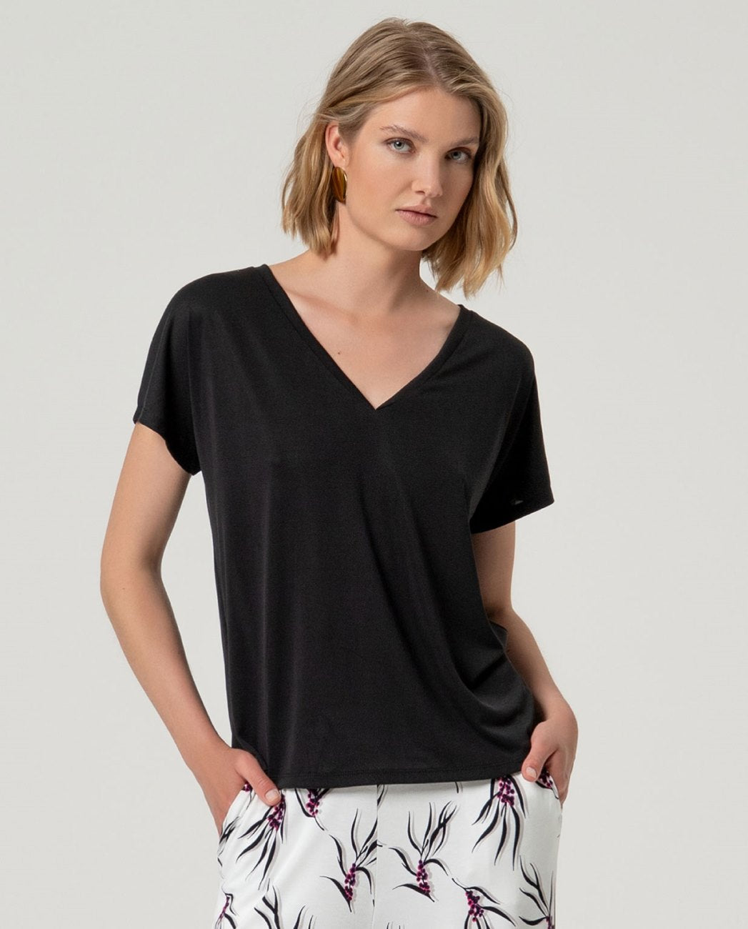 Black V-neck modal t-shirt, with short sleeves.