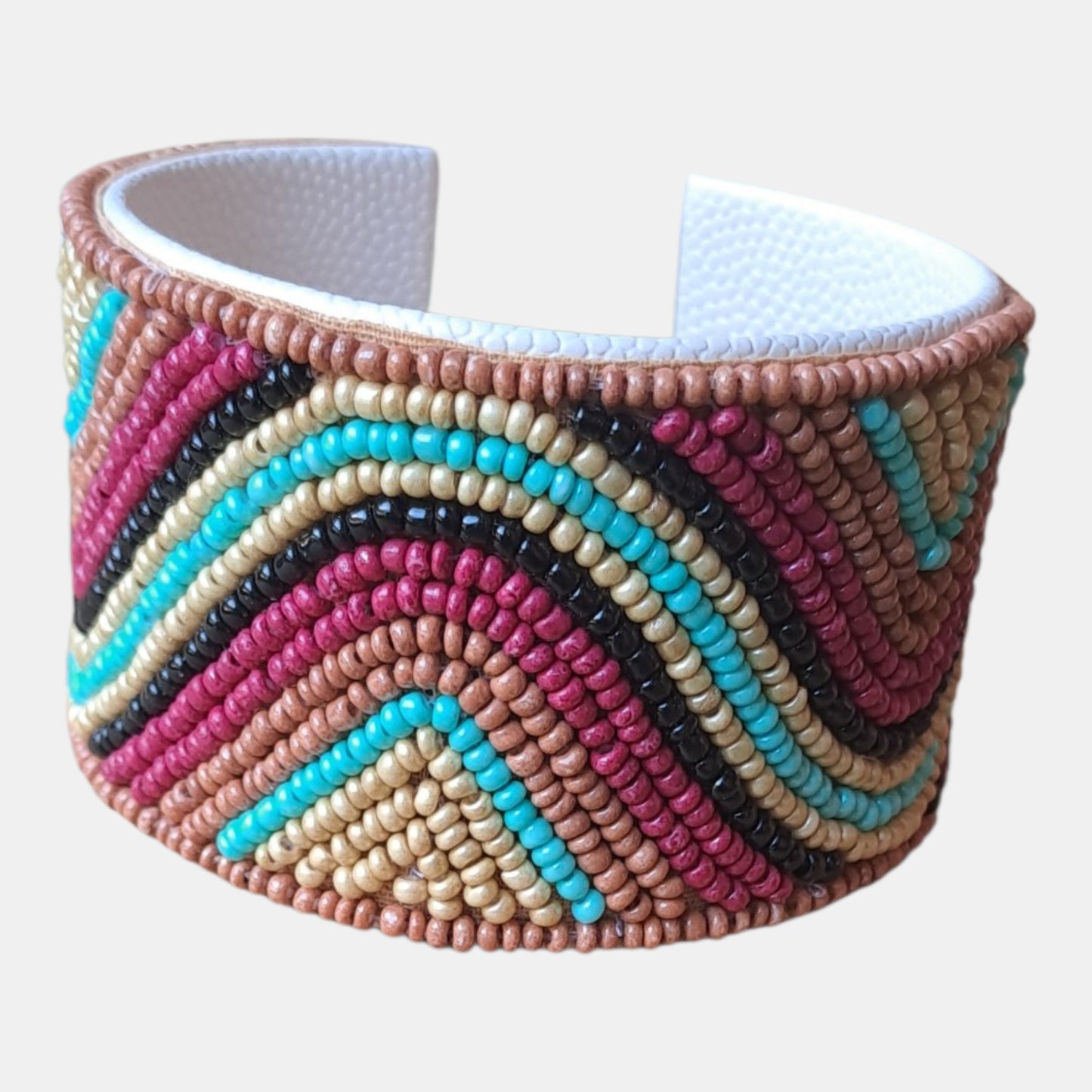 Adjustable brown, red, turquoise, black cuff beads bracelet boho style from 80% glass, 10% brass, 5% cotton, 5% polyurethane, measurements: 4,5cm wide, 18cm circumference