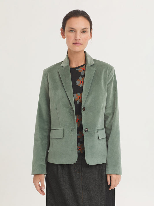 Fitted granite green blazer in plain stretch cotton corduroy fabric,notch lapels and 2 buttons front, flap pockets, tailored sleeves, lined. Composition: 98% Cotton, 2% Elastane