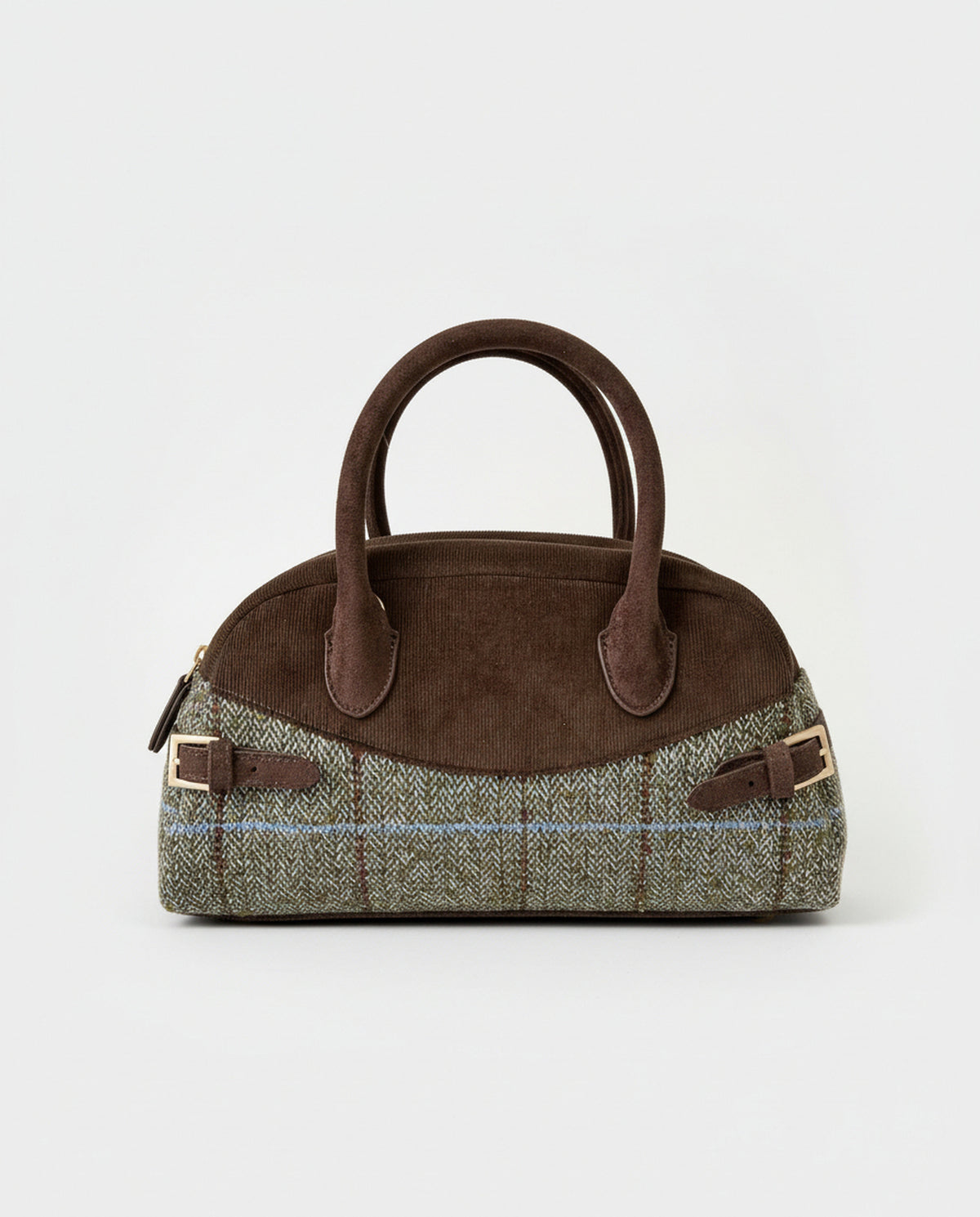 Elongated bowling green and brown bag with double handles and an adjustable crossbody strap. Body in warm, textured wool check fabric, mixed with smooth details and side buckles. Inner open pocket and zip pocket, 32cm x 17cm x 12cm