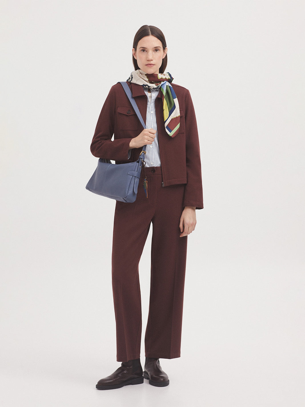 Chestnut trousers in Window Check fabric with recycled polyester blend, front fastening with zip and button, slash pockets, waistband with loops, belt loops and decorative buttons, straight leg with pressed crease, in 65% Polyester, 31% Viscose, 4% Elastane.