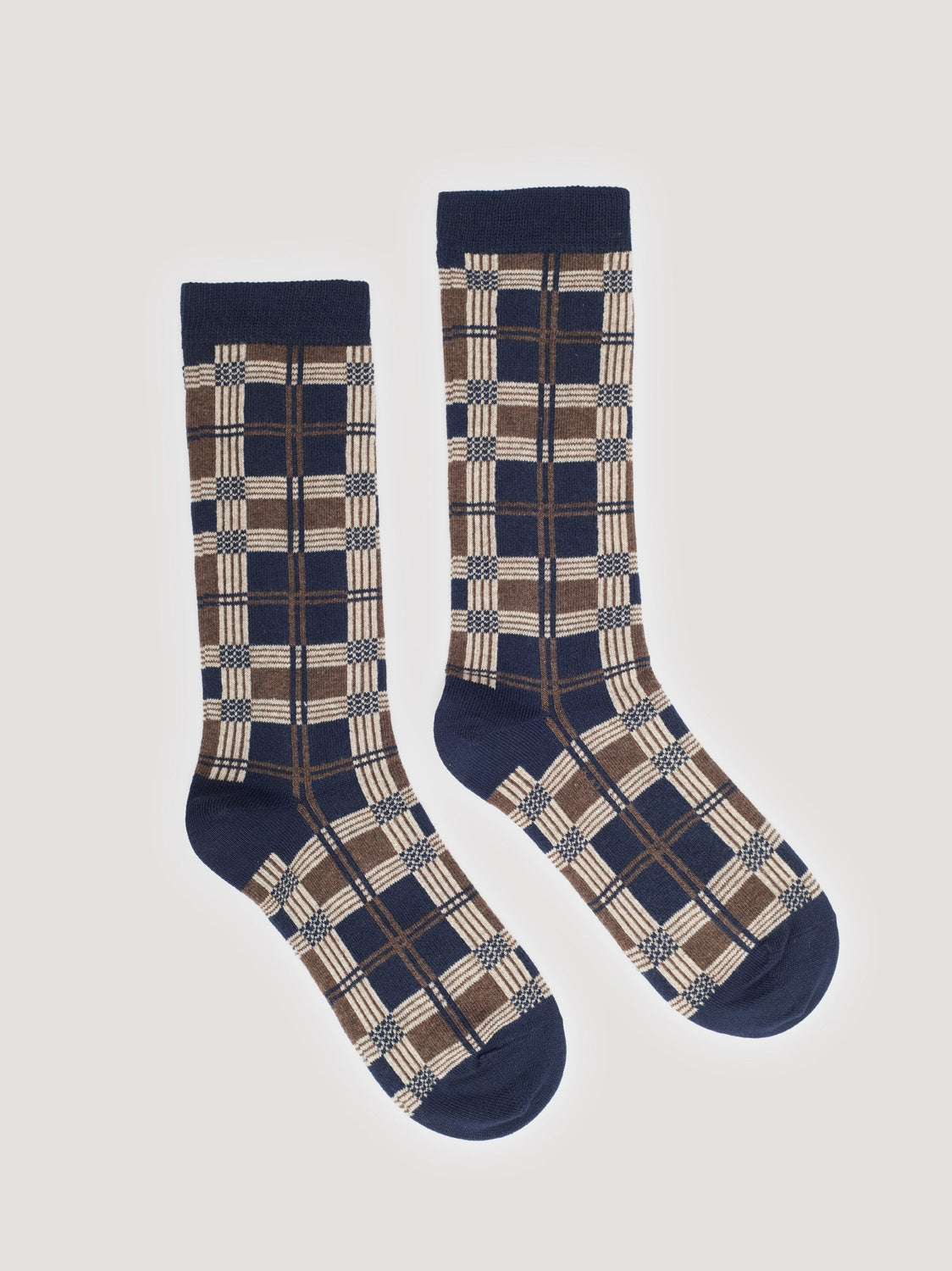 Pair of plaid patterned socks with navy blue, beige and ecru colors