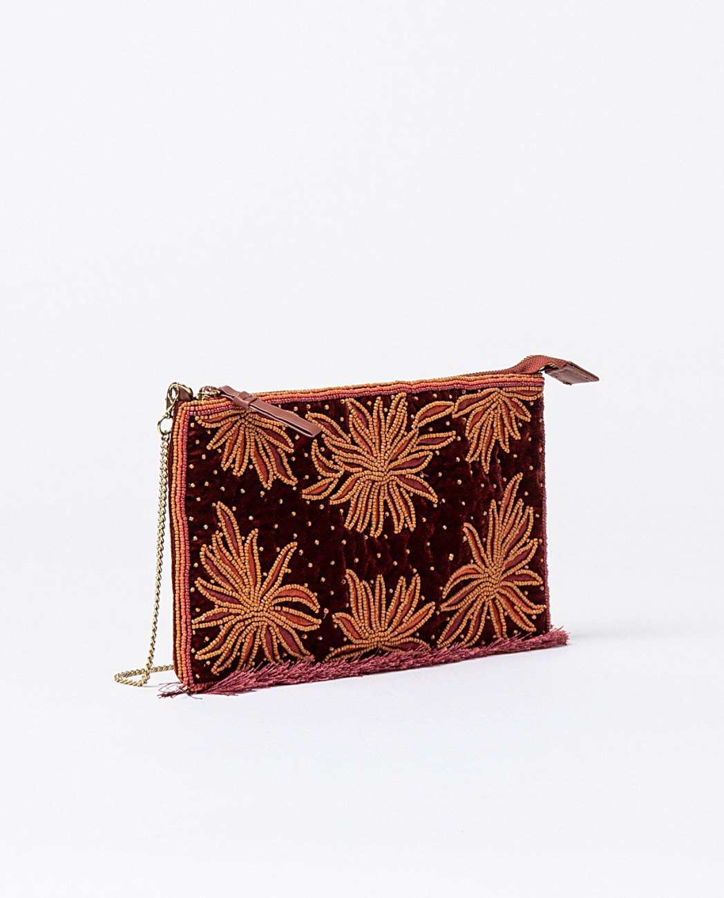 Clutch handbag made of chestnut soft velvet with an elaborate floral bead embroidery design.Fringe detail at the bottom, removable metal chain. One inner open packet. Lining.