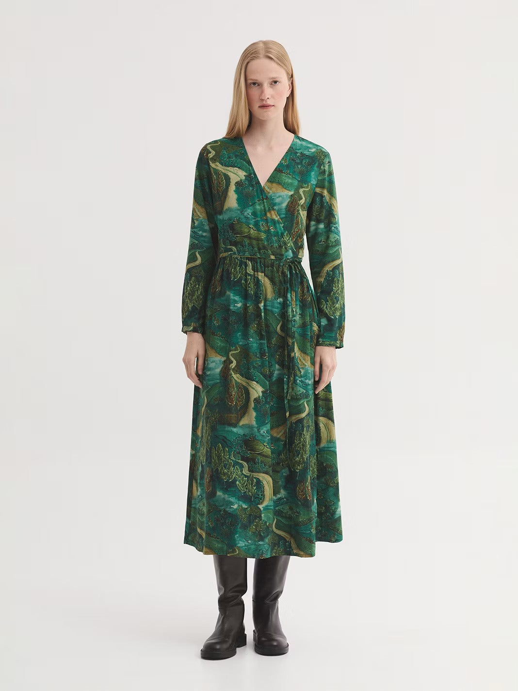 Pathways green print midi dress with V neck and wrap design with self-fabric tie waist. Puff sleeves with cuffs and button and flared skirt.
