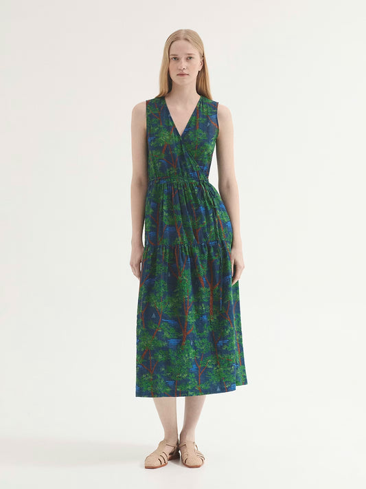 Blue Pine Trees print dress, with brown and green pine trees, wrap model with self-fabric tie waist for closing, V neck, Natural waist and ruffle skirt, side pockets, 50% Viscose,50% Cotton.