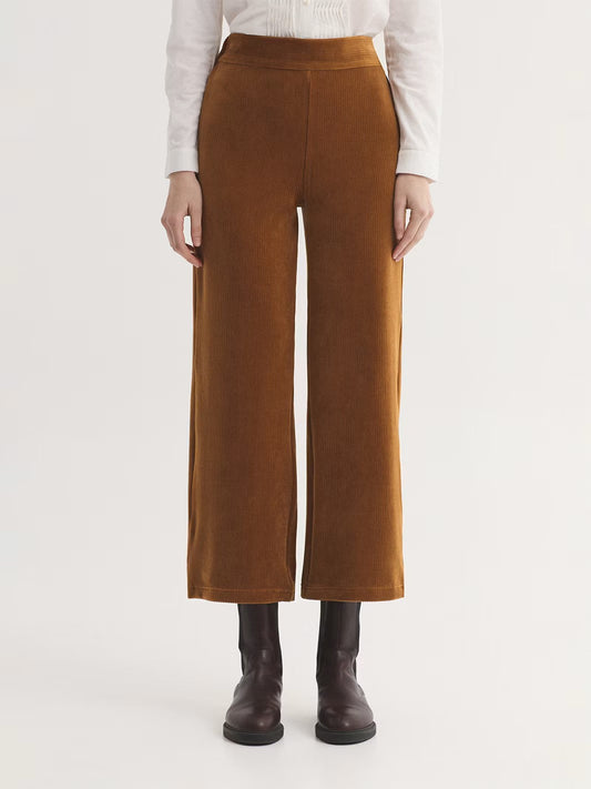 Straight fit ochre stretch cotton corduroy trousers. Elasticated waistband at back.