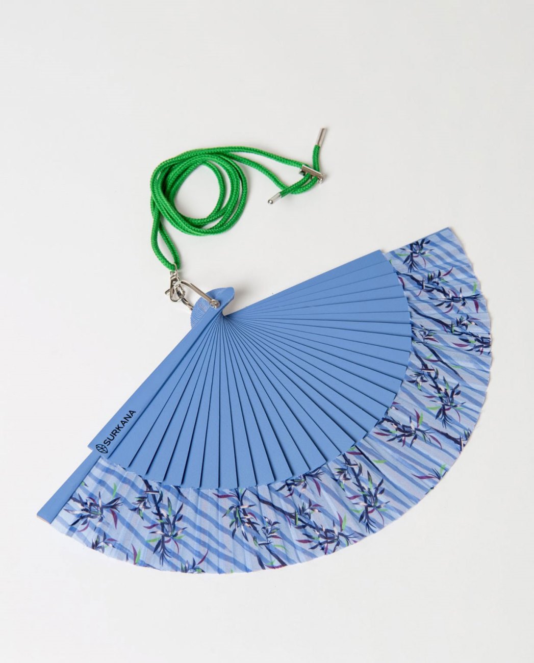 Blue fan with floral pattern and green strap.