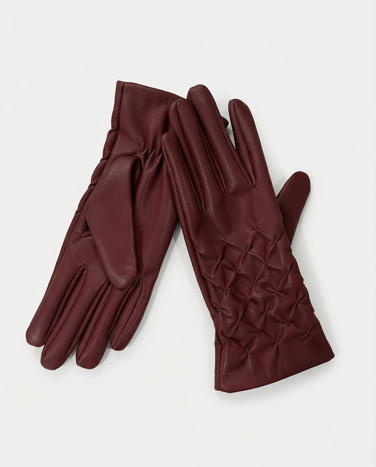 Glove maroon in smooth, soft-touch faux leather, with an elasticated shirred detail at the wrist. A fitted cut that slims the hand., 24cm long, 9.5cm wide