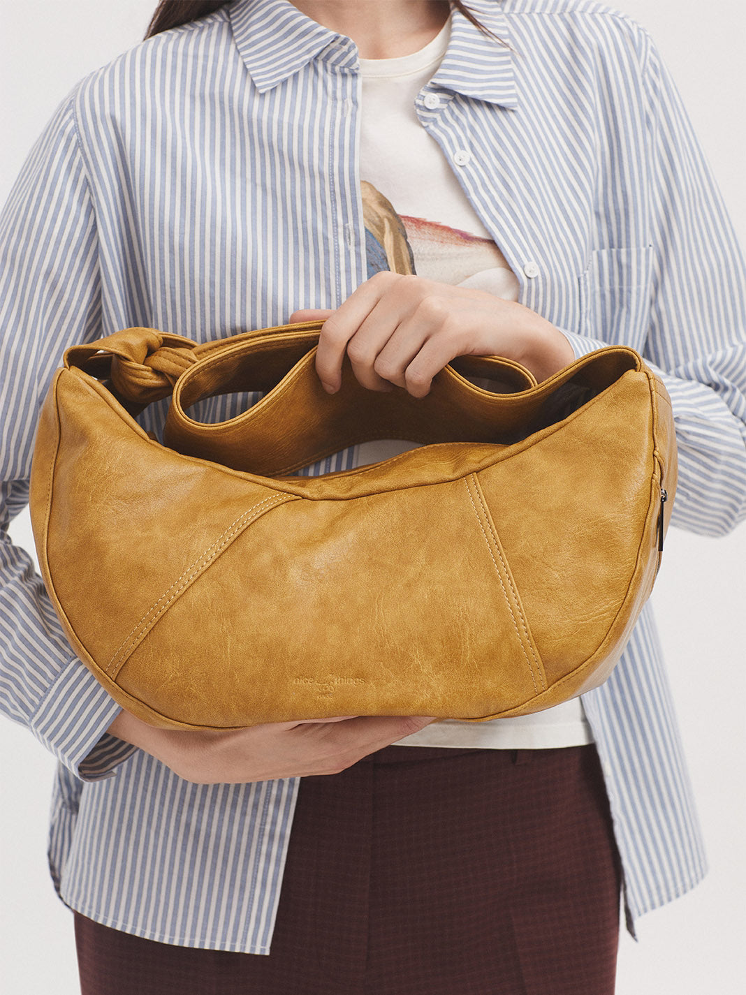 Washed leather effect half moon bag