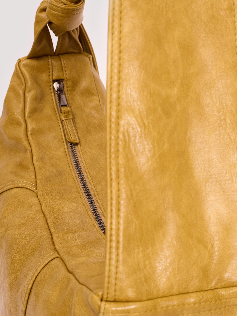Washed leather effect half moon bag