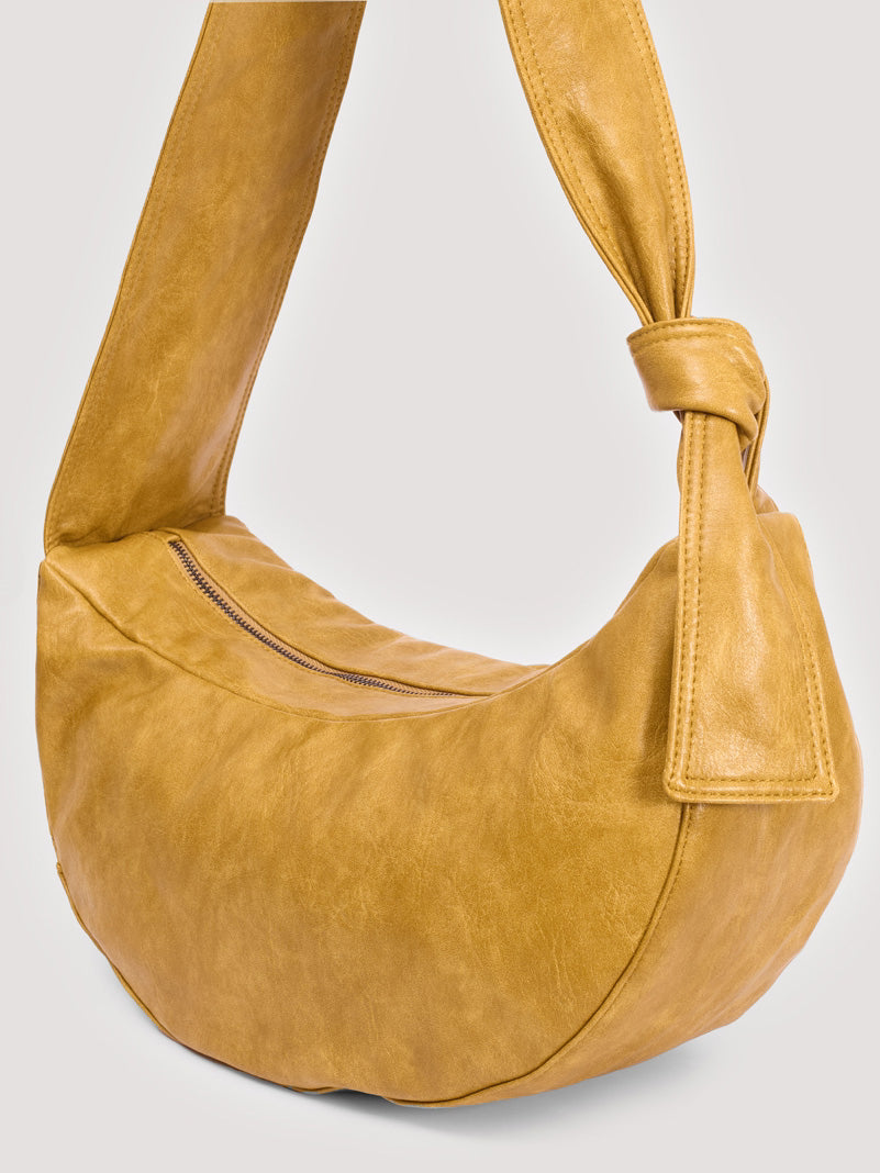 Washed leather effect half moon bag