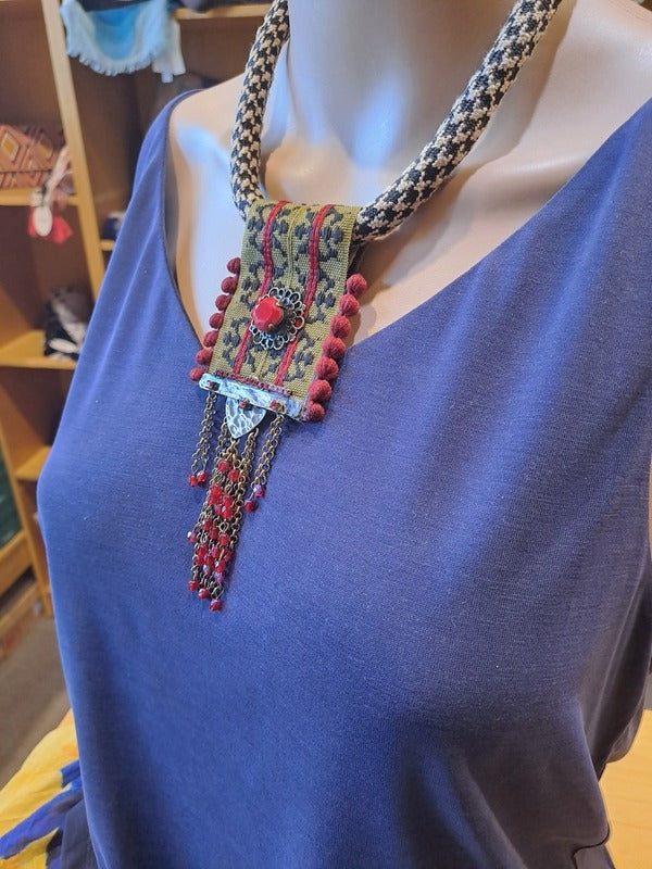 Necklace with embroidery fabric