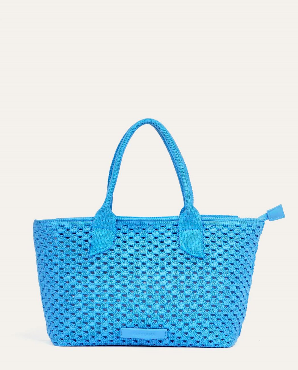 Blue shopper bag made of openwork knit fabric. Wide design with top handle, adjustable - removable strap and flexible structure. Zip closure.