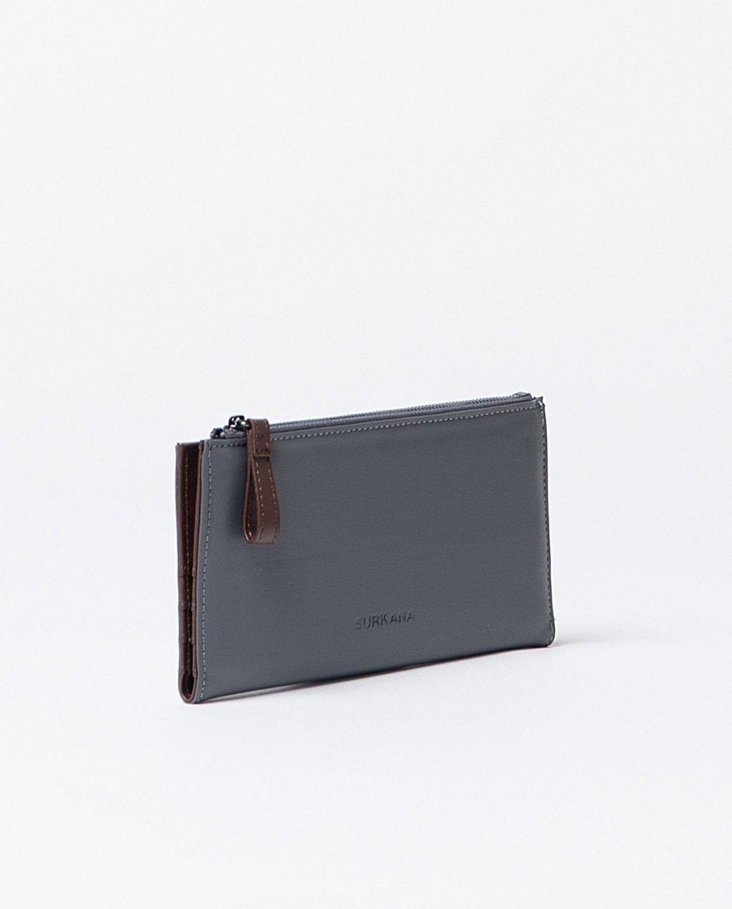 Large compact bi-color wallet in grey and chestnut faux leather, includes compartments for cards, a zippered pocket and snap buttons closure.