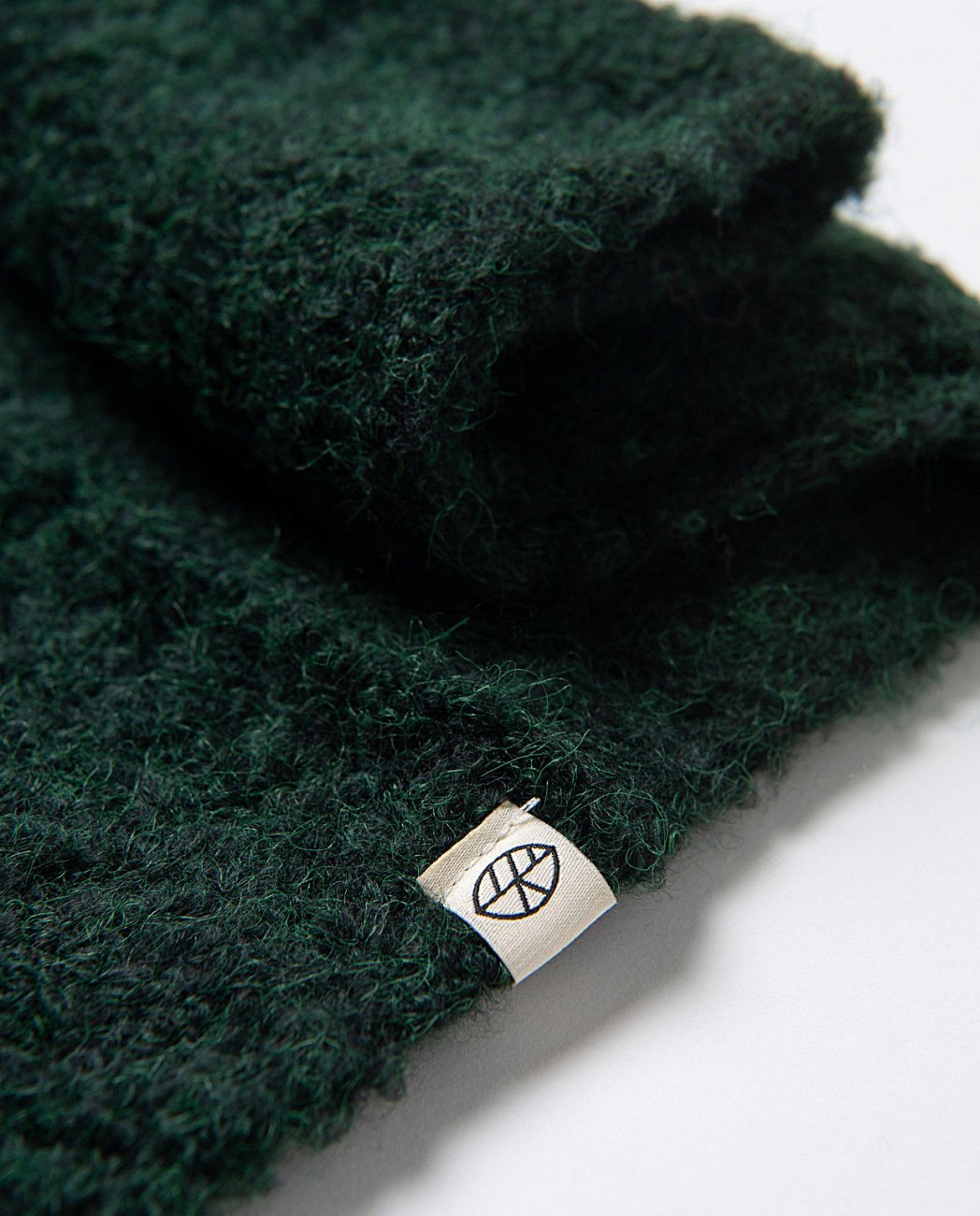 Knitted collar in boucle fabric, warm and with a fluffy texture, in dark green color