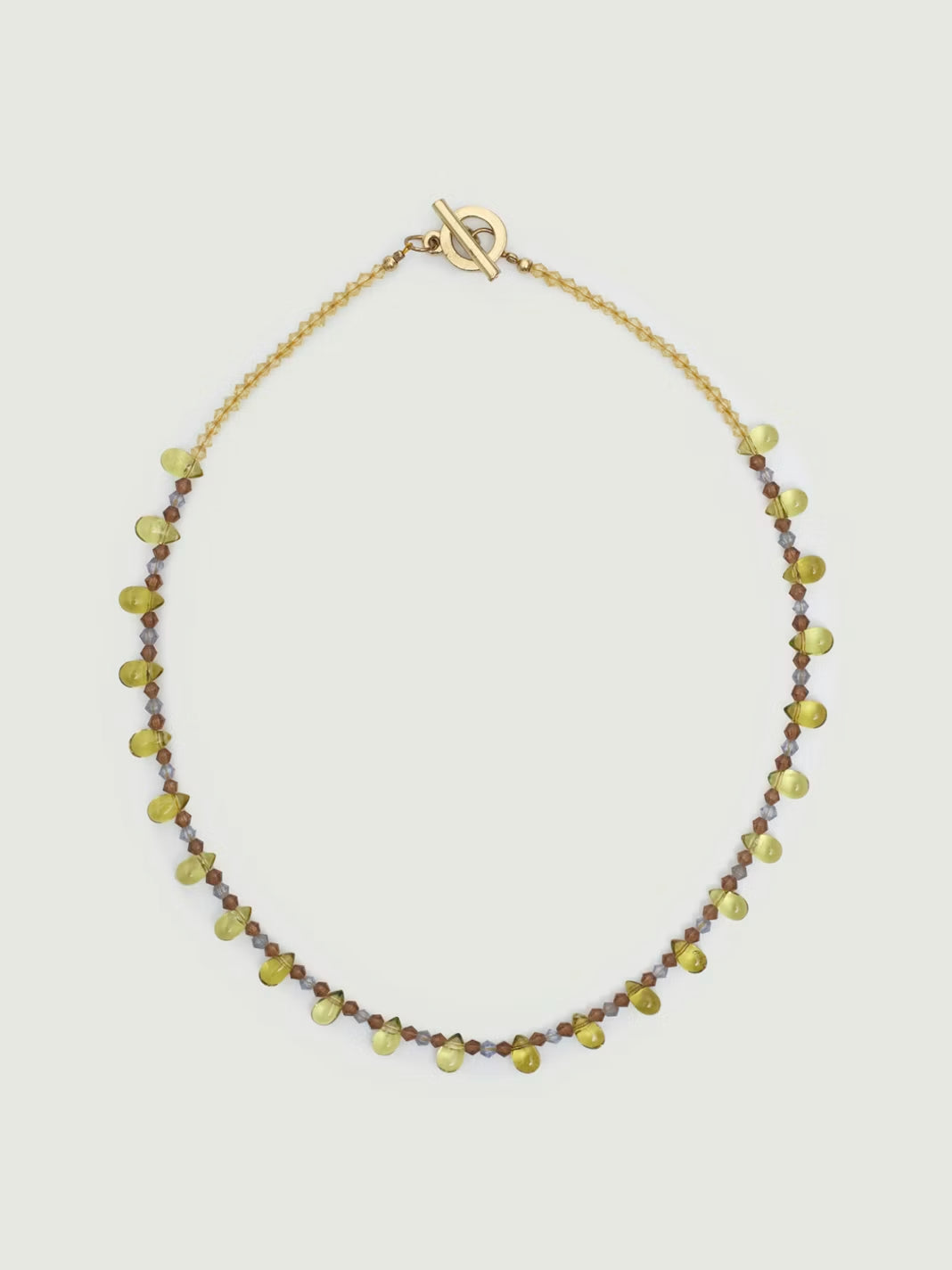 Necklace made of small resin beads in khaki, yellow colors, in bronze chain, 20 cm in length.