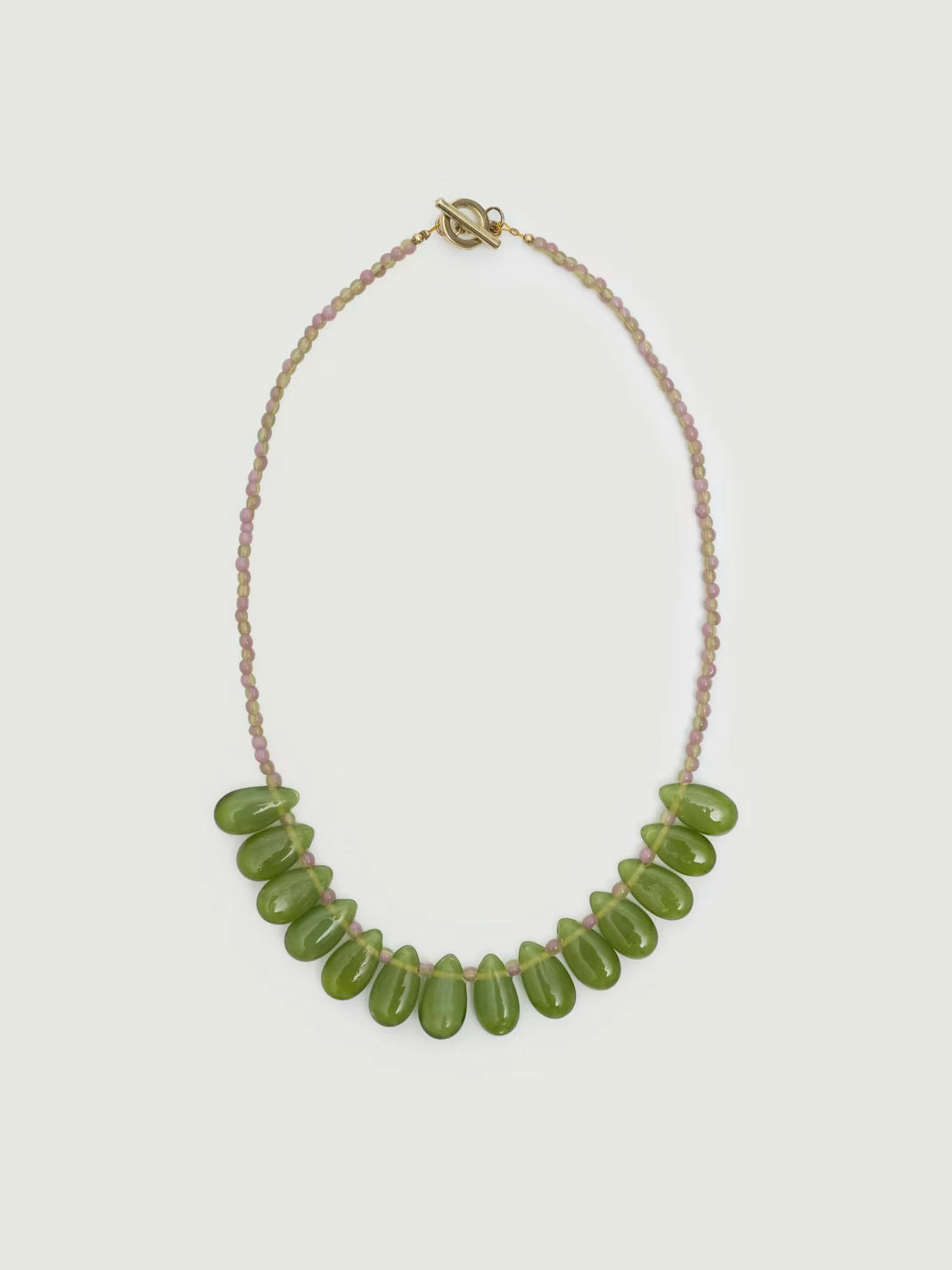 Teardrop shaped resin beaded necklace green, small beads at the bag and bigger teardrops beads at front, bronze closure, 20cm in length