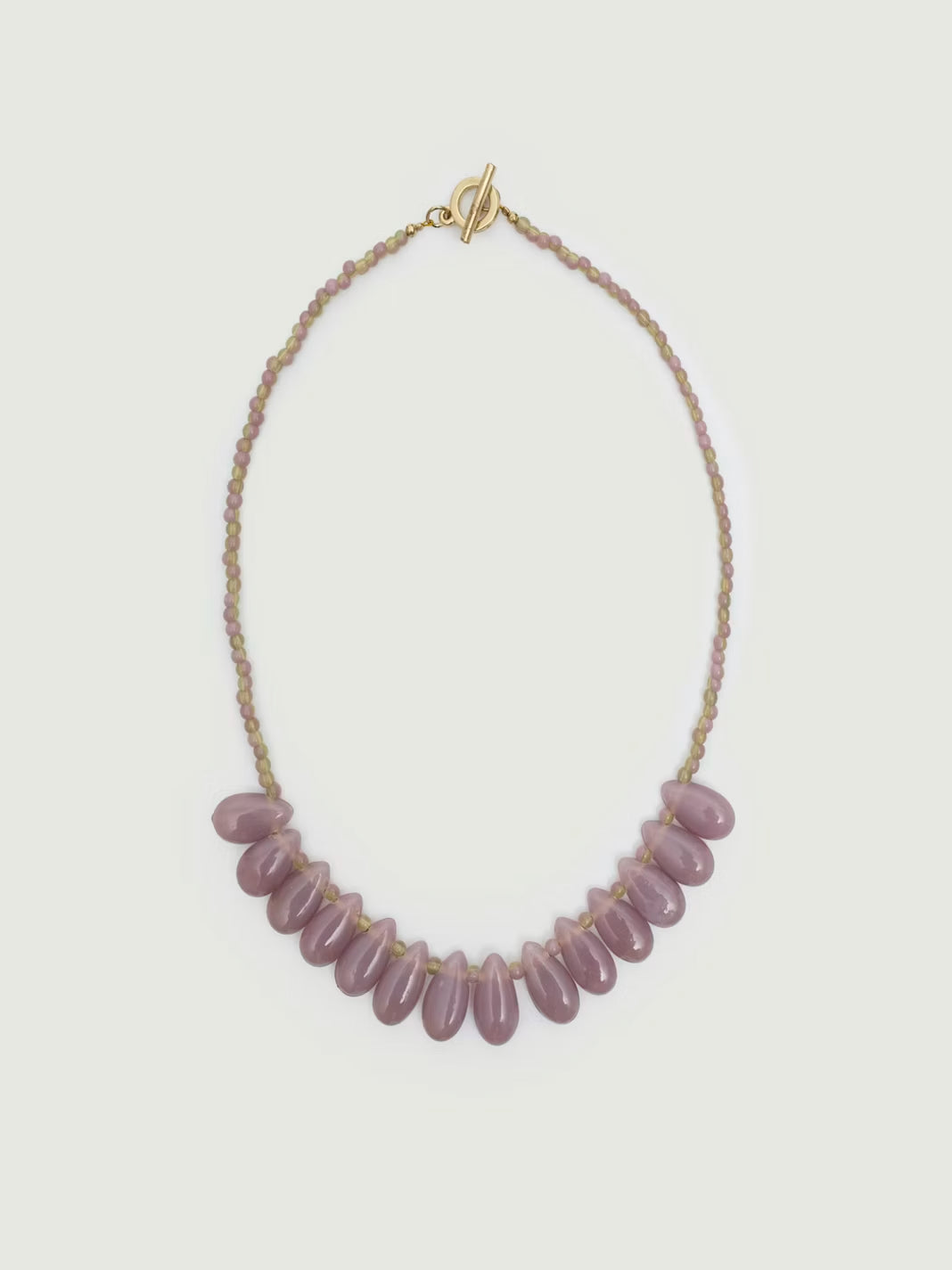 Teardrop shaped resin beaded necklace Mauve, small beads at the bag and bigger teardrops beads at front, bronze closure, 20cm in length
