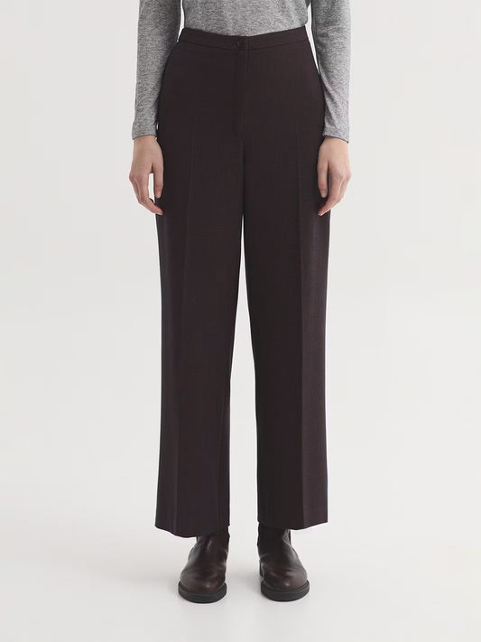 Mottled chestnut  trousers in recycled stretch polyester blend fabric. Featuring zip and button fastening at front. Wide leg.
