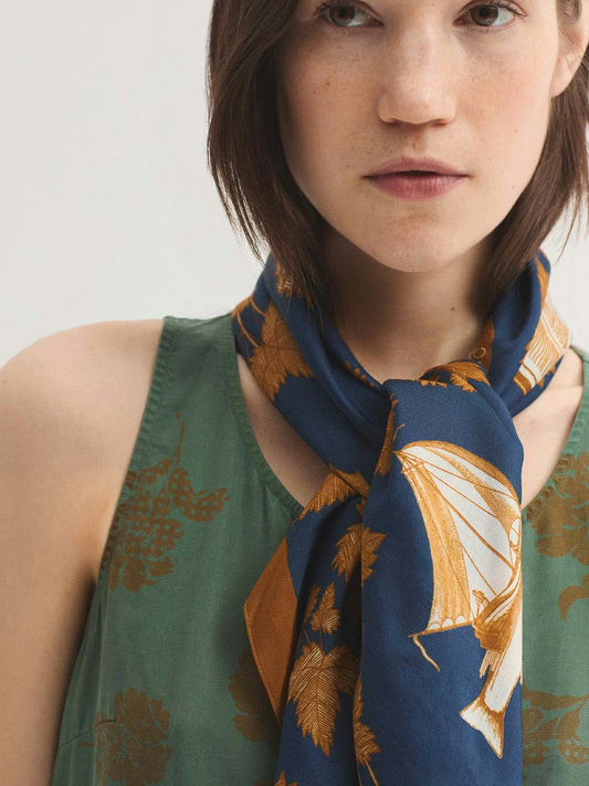 Navy square scarf, digital printing with cinnamon and ecru leaves, books, fishes designs, 90 x 90 cm, 57 % Modal, 43% Cupro.
