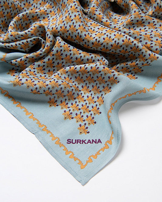 Rectangular little flowers printed scarf made of viscose twill, in light blue orange, brown colors