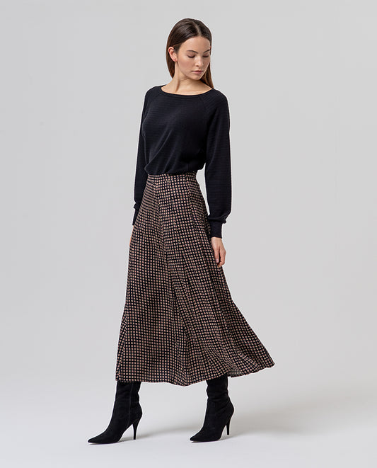 Black flared midi skirt with a fluid viscose drape,smooth waist and an A-line silhouette, feminine and comfy. Small geometric foulard-style print, multicolour