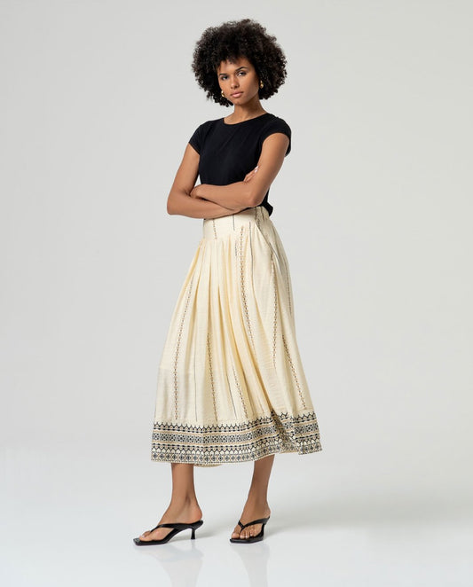 Ecru midi skirt with black embroidered print.