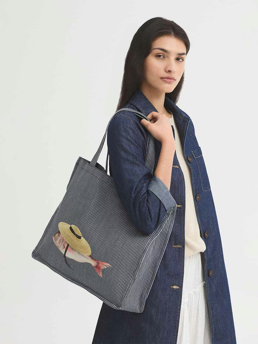 Large-capacity cotton striped navy-ecru printed with fish  with straw provencal hat collection bag, inside pocket Debossed logo, 37 cm tall x 44cm wide x 12 cm deep.