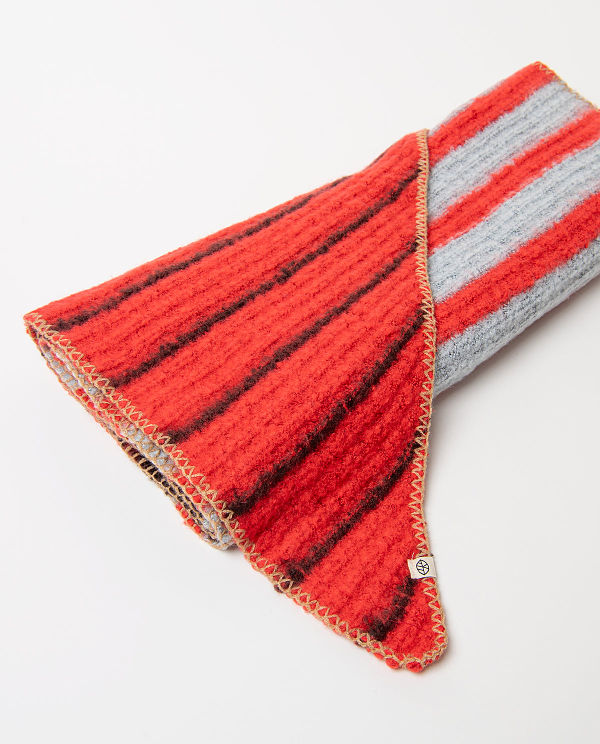 Soft, maroon warm knit scarf with contrast stripes and pointed ends finished with a scalloped edge, 240cm long, 53cm wide
