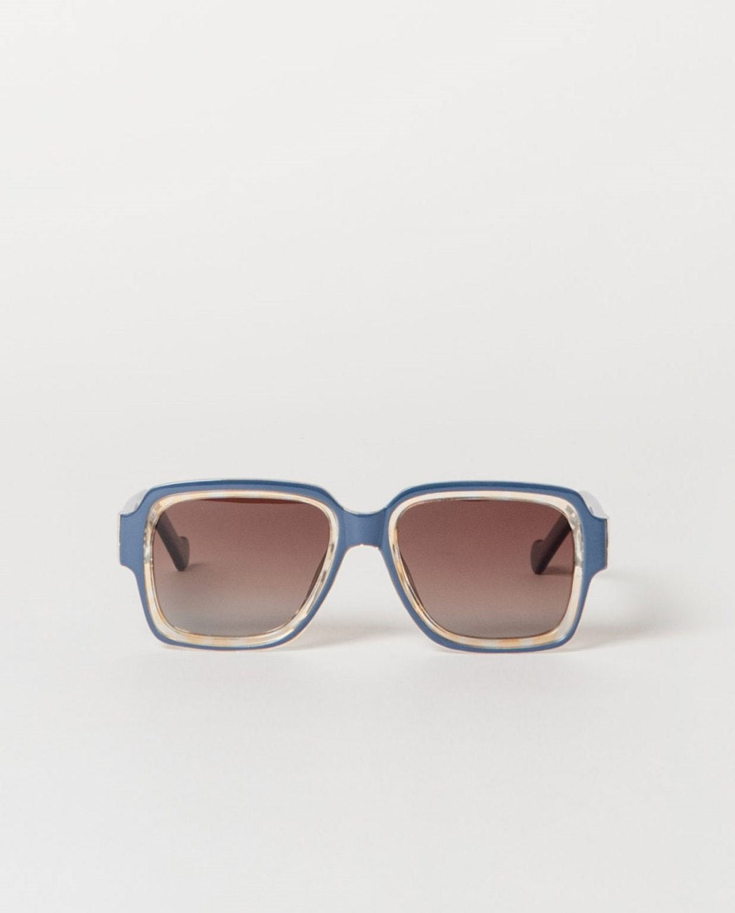 Blue sunglasses with a clear frame and brown lenses.