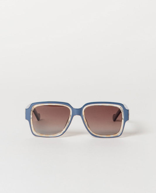 Blue sunglasses with a clear frame and brown lenses.