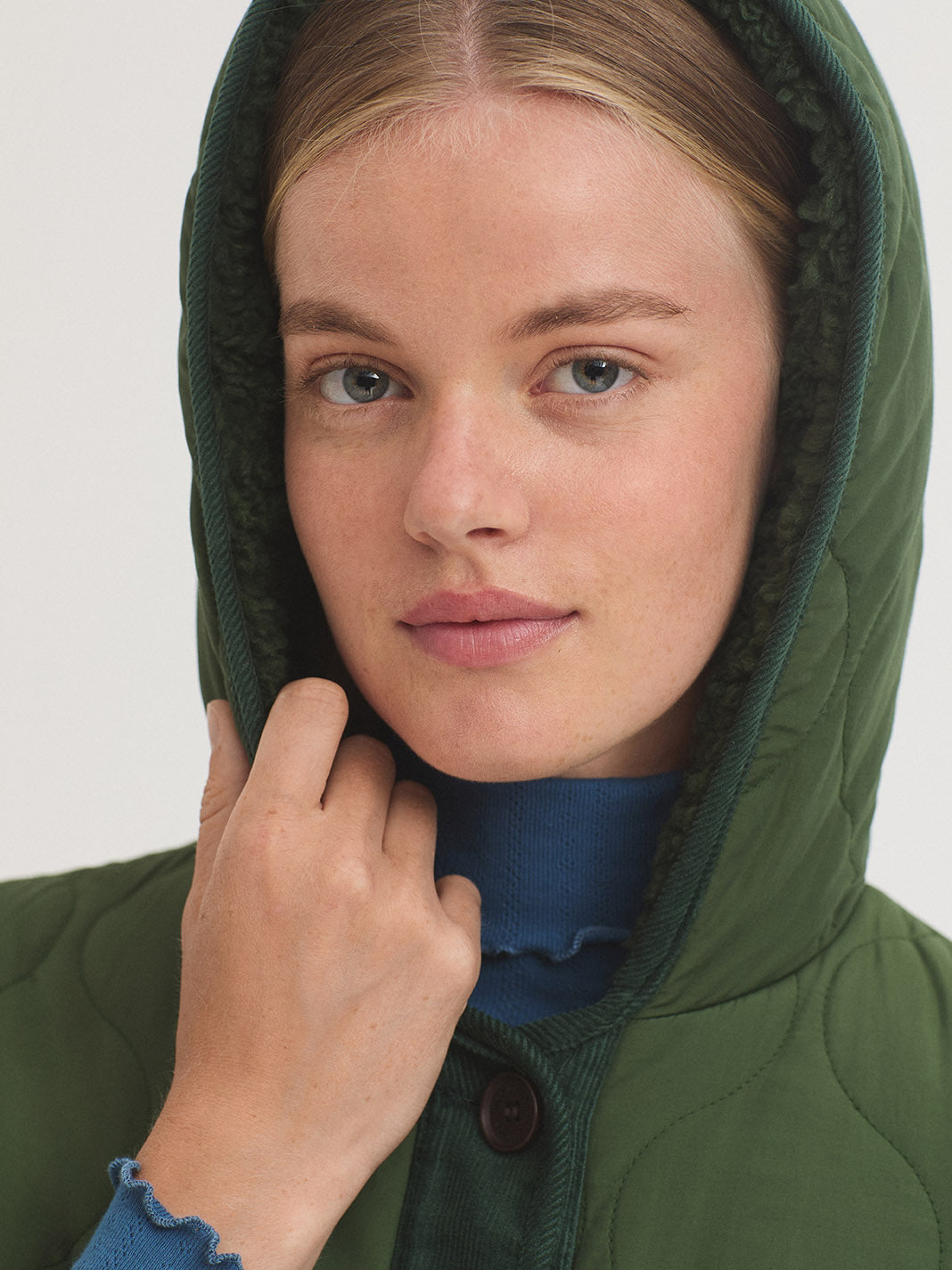 Sheepskin lined hooded trench coat