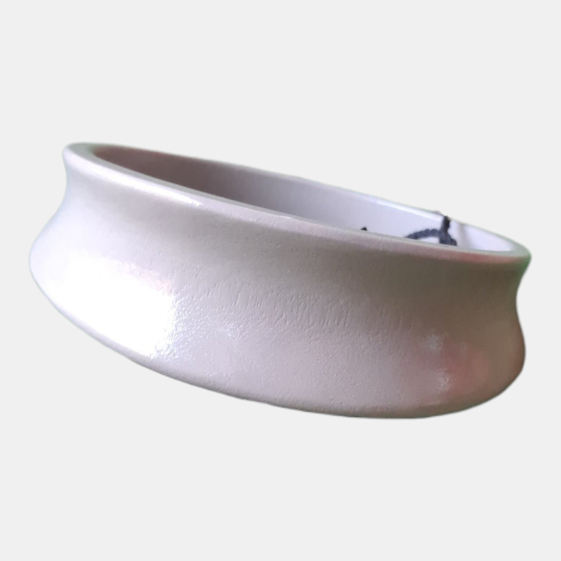 Wooden bracelet from 80% wood, 10% paper, 5% lacquer, 5% printer ink, measurements: 2 - 3cm wide, 7,5cm diam.