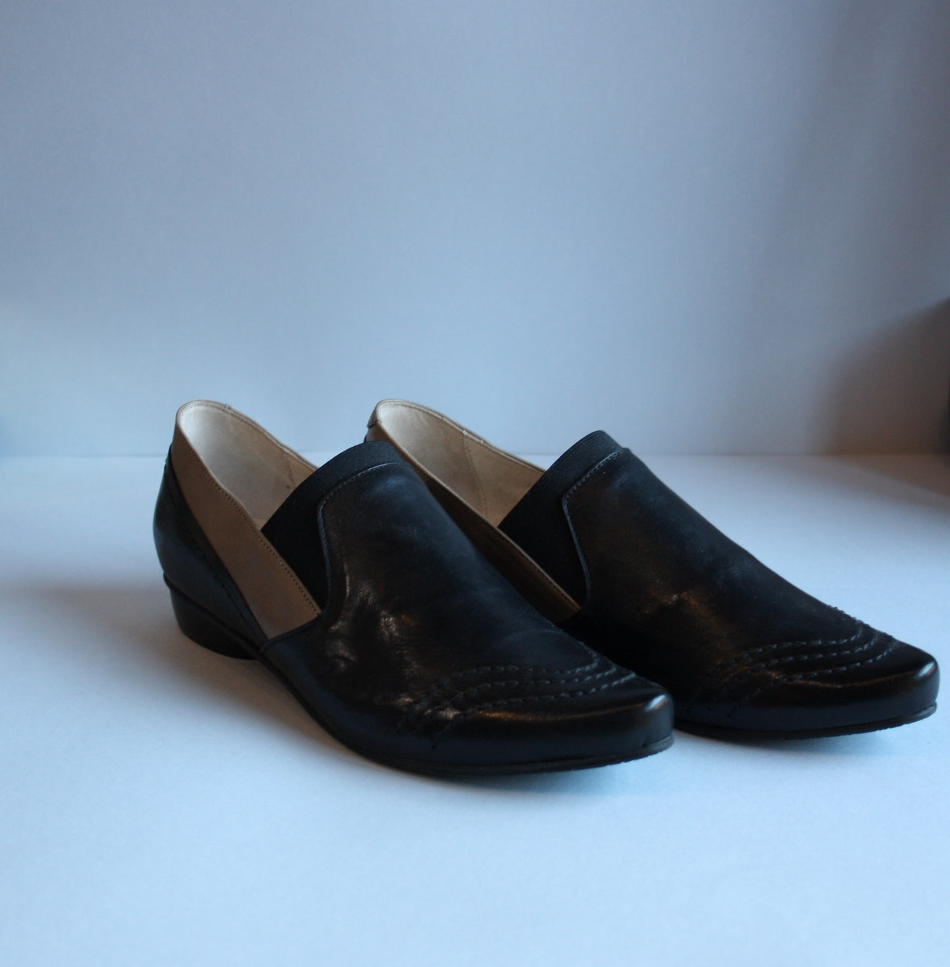 Loafer style black flat shoes