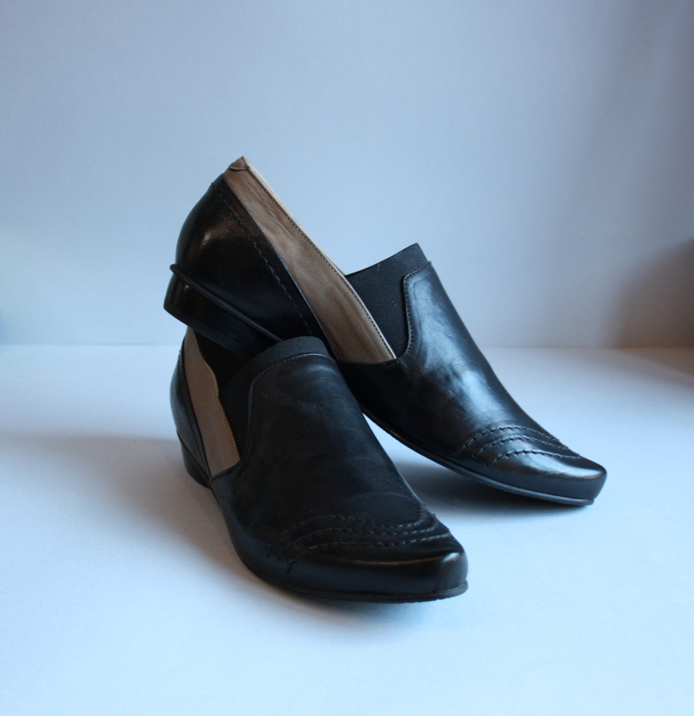 Loafer style black flat shoes