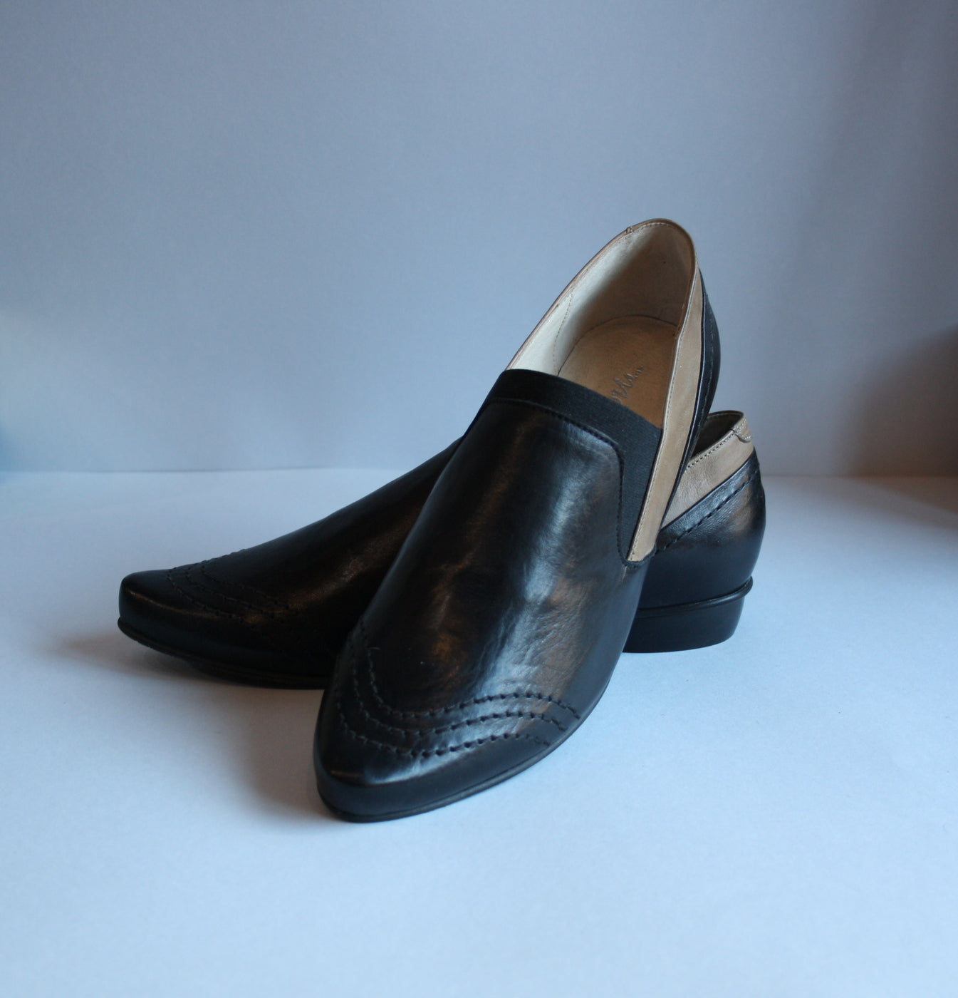 Loafer style black flat shoes