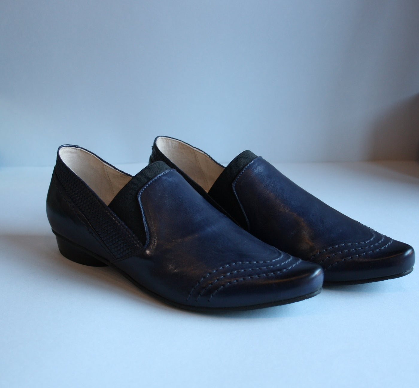 Loafer style blue flat shoes